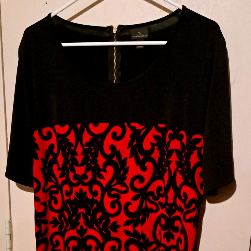 Women's variety pack blouses and one making dress size large all items included.
